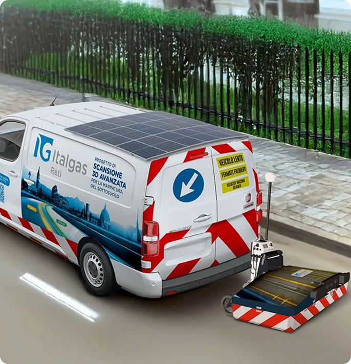A white van with red stripes and solar panels on top, marked 